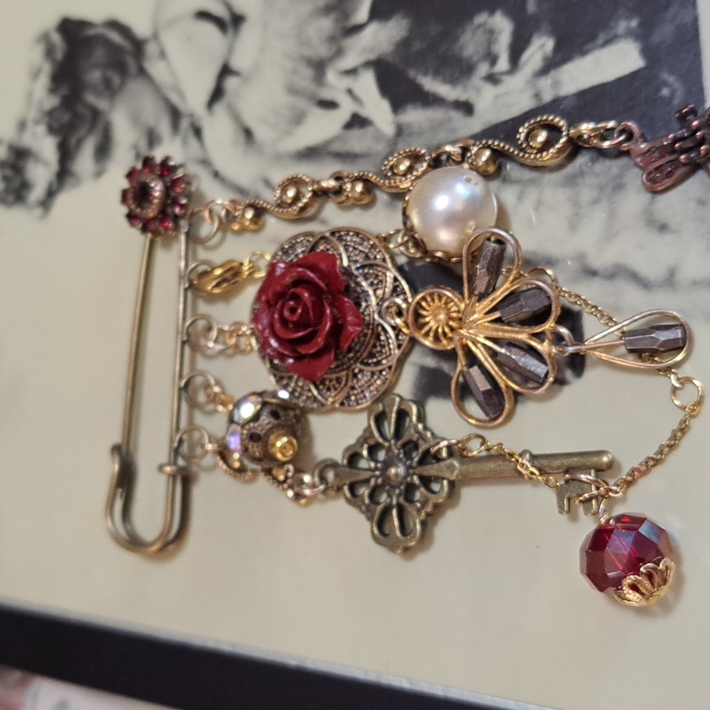Brass Brooch. Handmade with vintage components and beads. Touch deep red.